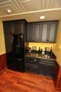 Check out the decorative ceiling and flooring around this wet bar