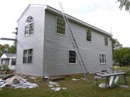 Siding and soffit work on exterior 