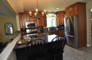 New kitchen cabinets, granite countertops, backsplash and stainless steel appliances