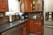 New kitchen counters and backsplash by Drumm Design Remodel