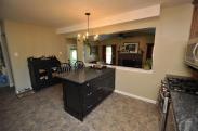 This kitchen cabinet was designed with a finish that was different, but coordinating with the kitchen