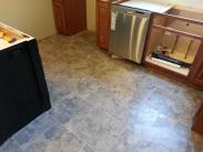 New tile kitchen floor installation by Drumm Design Remodel