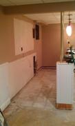 All of the cabinets and tile are removed for repairs