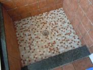 Check out the tile in this shower base, it pulls the color scheme together nicely