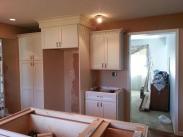 Cabinets going in and shown is the space for the new refrigerator