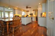 Check out these beautiful floors they not only accent with the cabinets nicely, but they unify the entire space