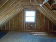 Check out all of this storage room and headroom in the new garage attic