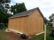 The shed sheathed in and ready for siding