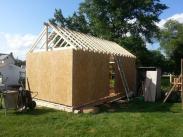 A view of the shed from the back being framed up