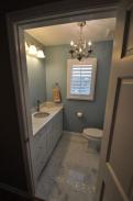 A terrific new vanity and tile work by Drumm Design Remodel