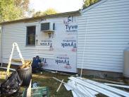 Drumm Design Remodel installed a new vapor barrier and replaced the siding so that the home looked good as new