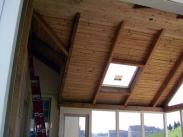 Loving this exposed beam tongue and groove ceiling and skylight