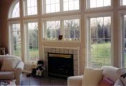 A view of the wall of windows and awesome fireplace