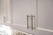 The brushed nickel finish on these cabinet handles accent with the cabinets and are very durable