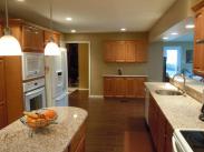 View from the center island, this is one roomy kitchen!