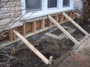 Exterior support braces keep home safe while work is completed